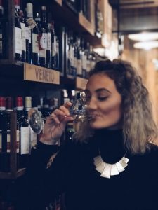 Girl Going Global enjoys wine at Signor Vino wine shop, Verona